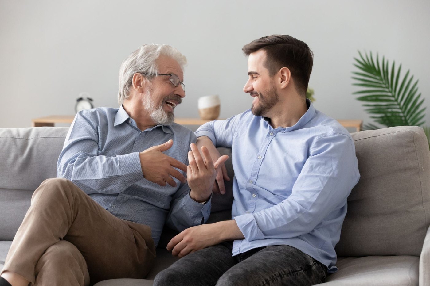 Adult child talking with parent about retirement planning